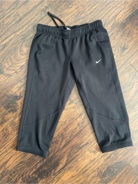 Nike thermo fit Black Capri Sweatpants with White Swoosh